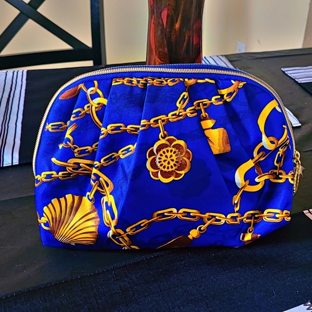 Estee Lauder Blue and Gold Clutch with Ornate Design